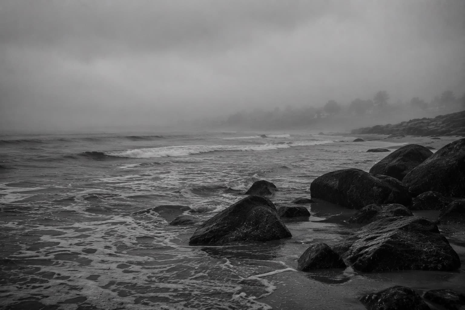 Rocky Maine shoreline in the fog